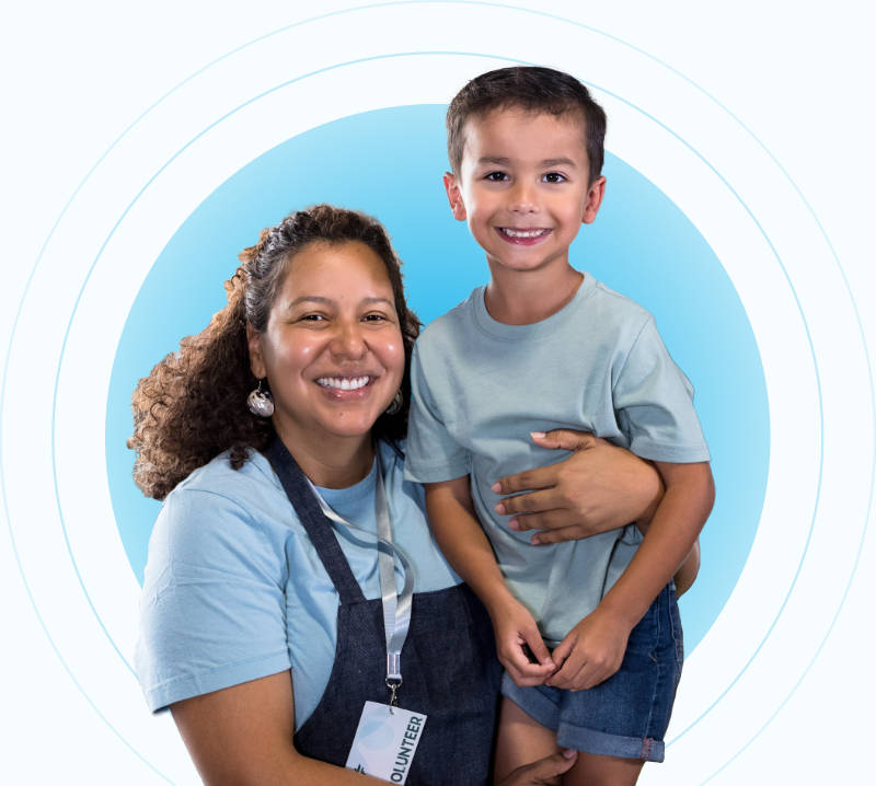 Woman holding child hero